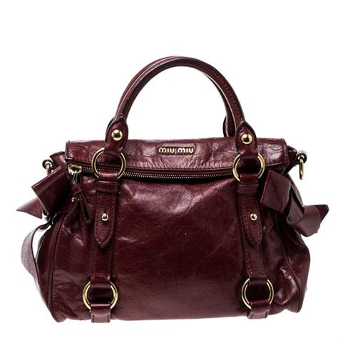 miu miu top handle leather bow bag|Miu Miu Leather Top Handle Bag .